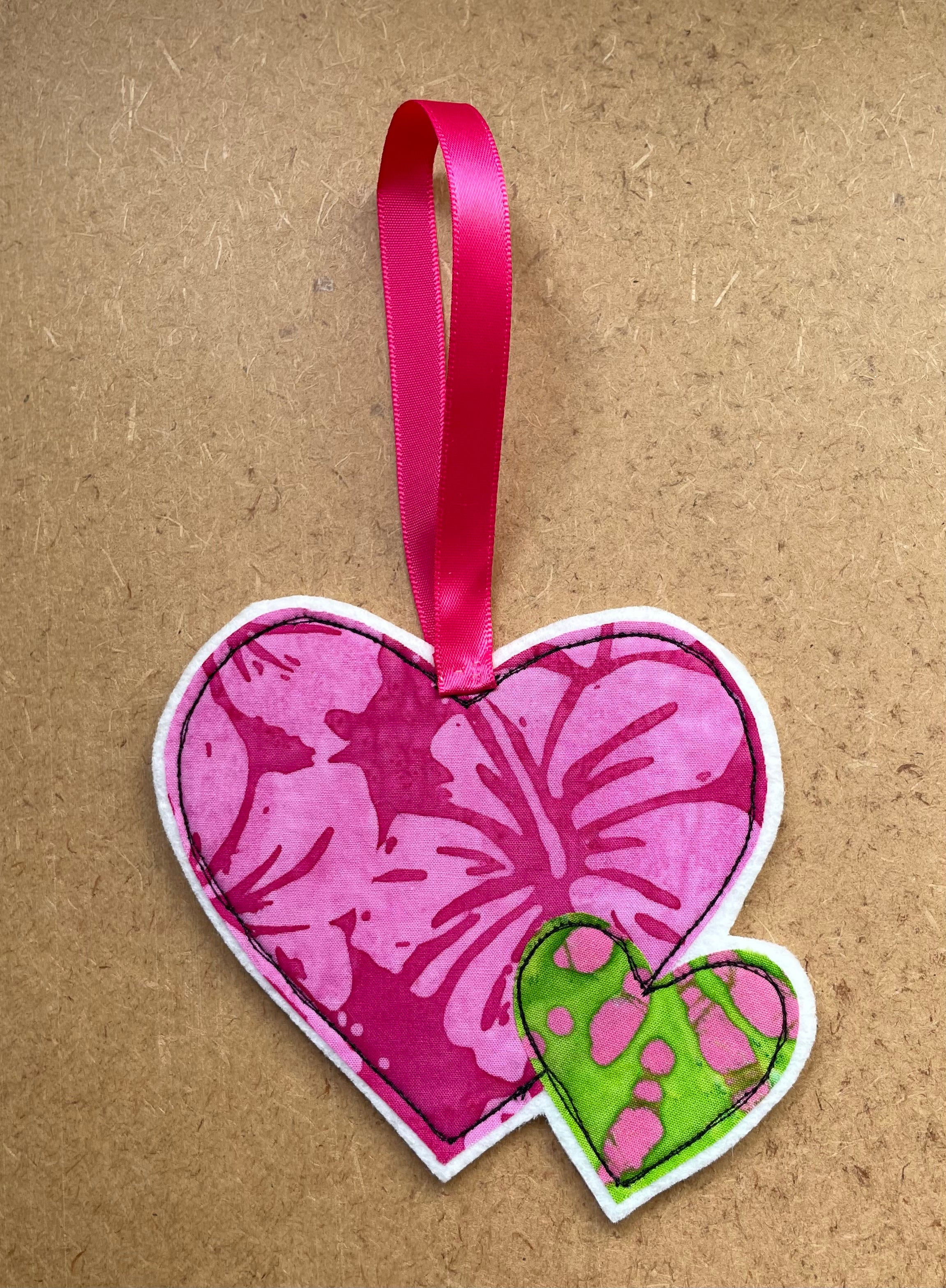 Pink Mother and Child Hanging Hearts