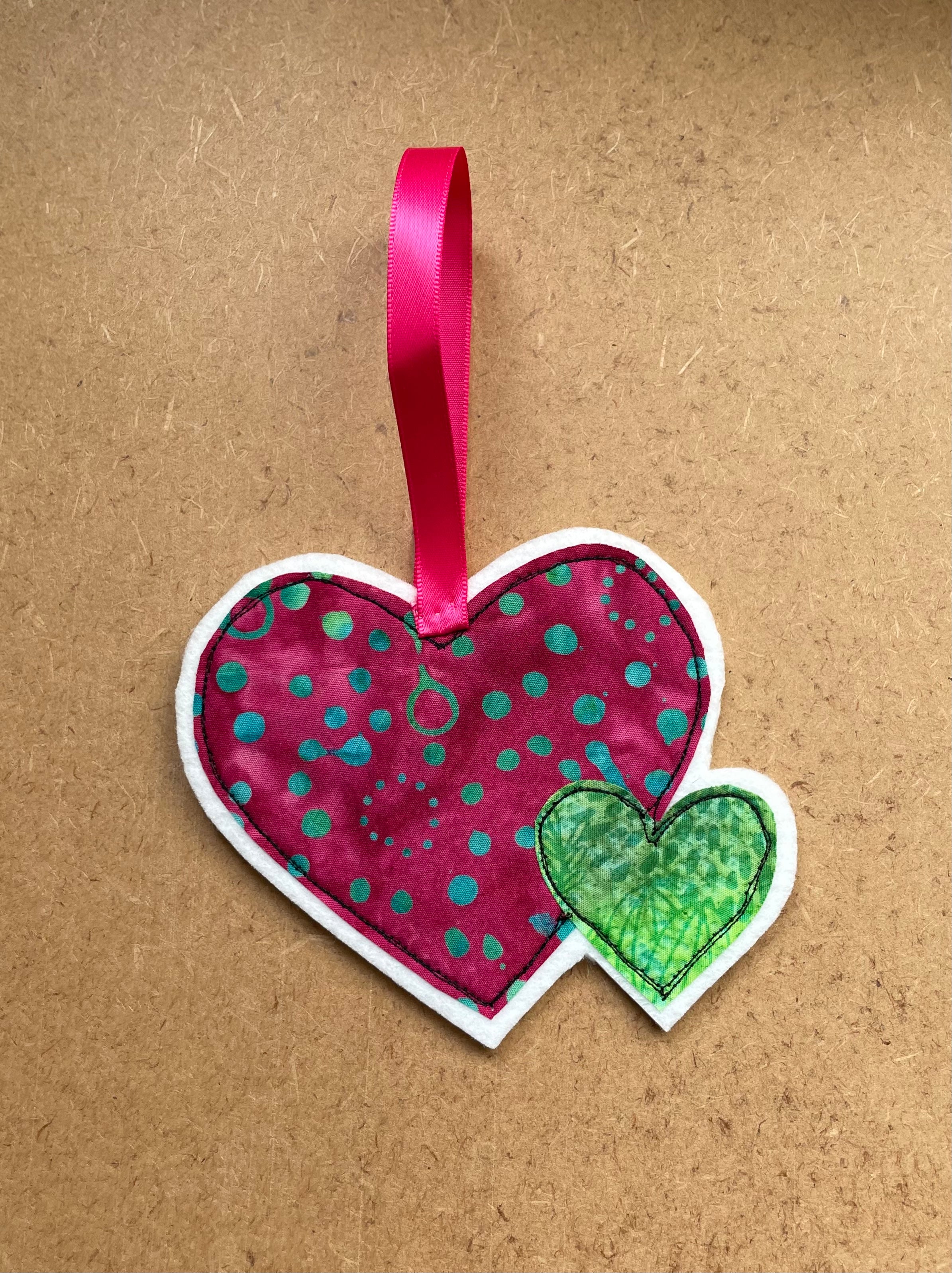 Pink Mother and Child Hanging Hearts