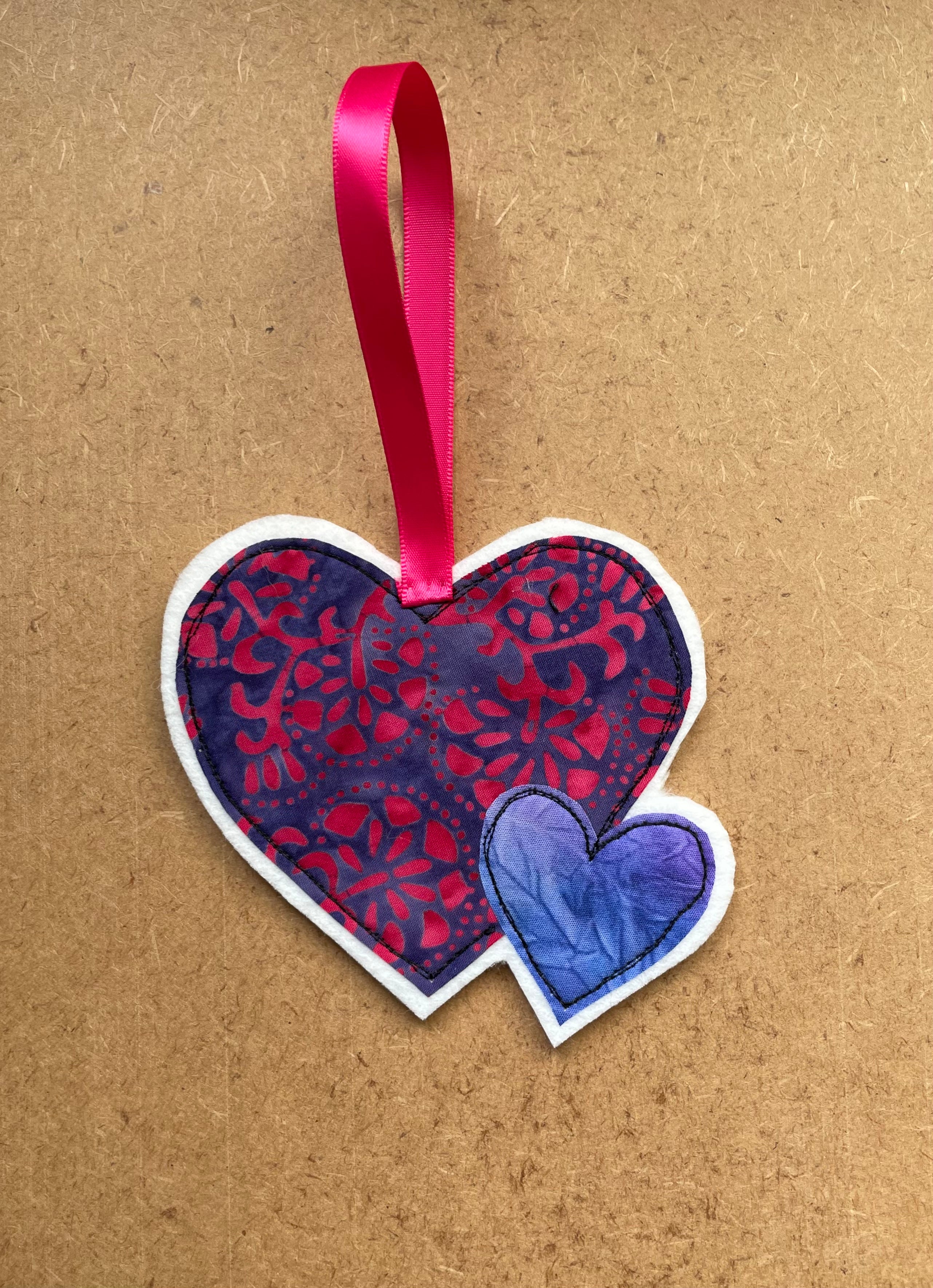 Pink Mother and Child Hanging Hearts